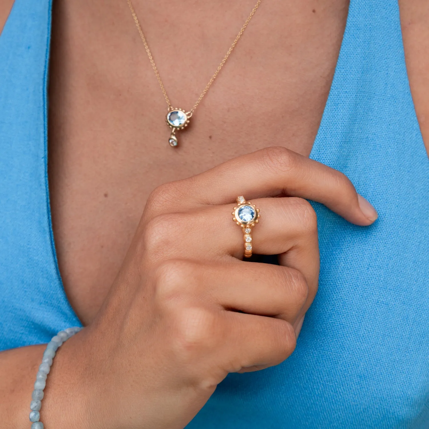 14k Gold Anemone Ring with Round Blue Topaz