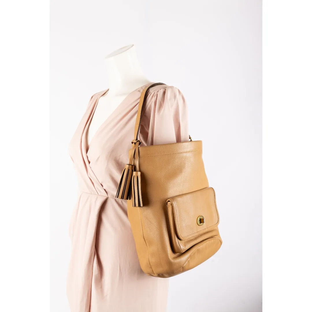 Coach Beige Leather Legacy Tassel Bucket Bag