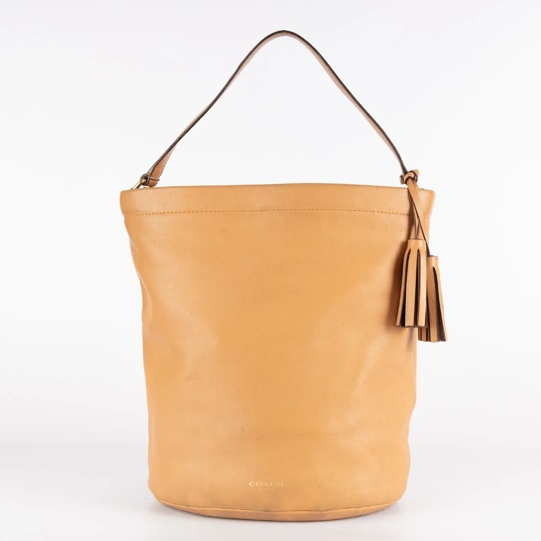 Coach Beige Leather Legacy Tassel Bucket Bag