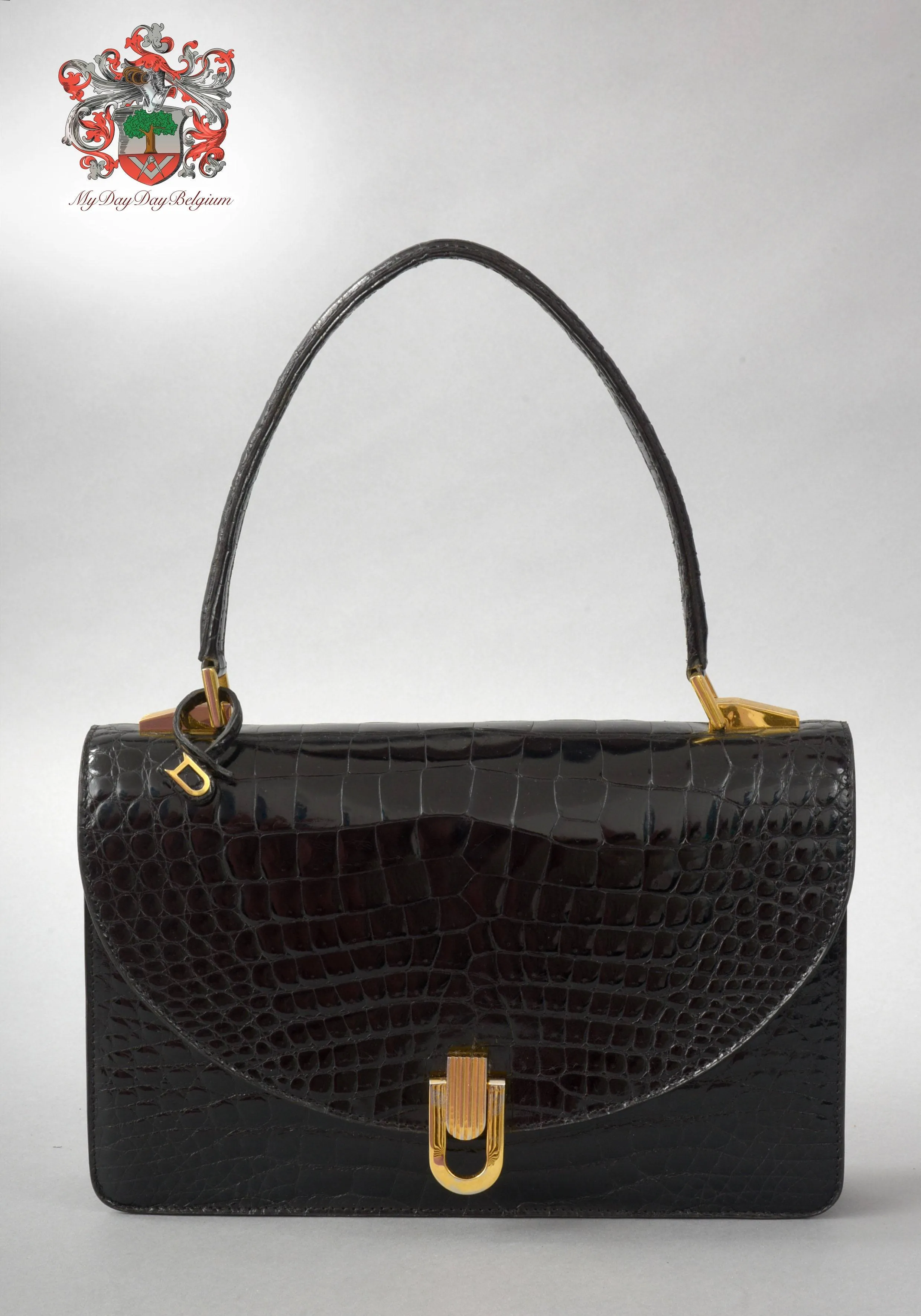 Delvaux vintage top handle handbag in alligator leather 1980